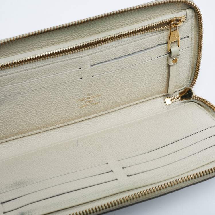 Pre Owned Louis Vuitton Off White Monogram Empreinte Leather Zippy Wallet