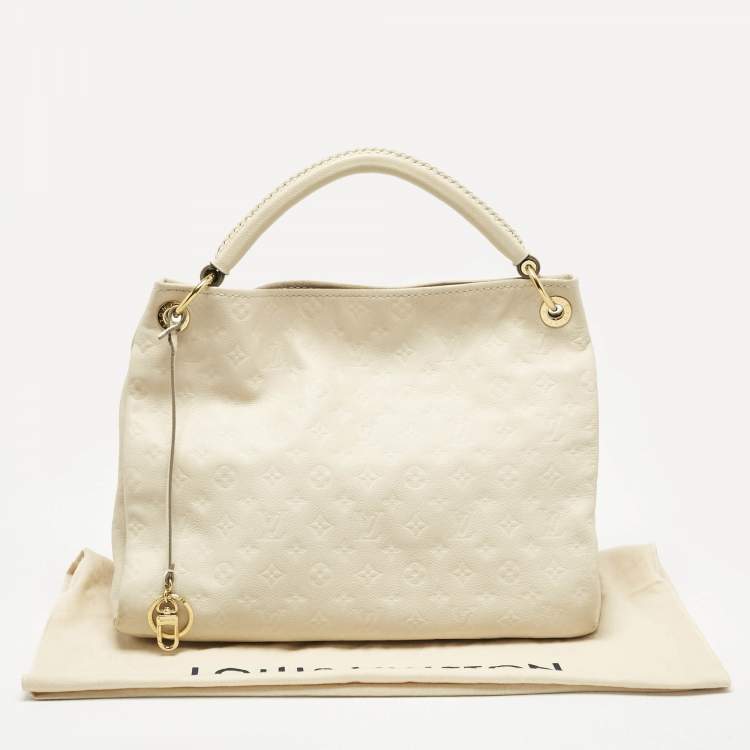 Pre Owned Louis Vuitton Neige Monogram Empreinte Leather Artsy MM Bag