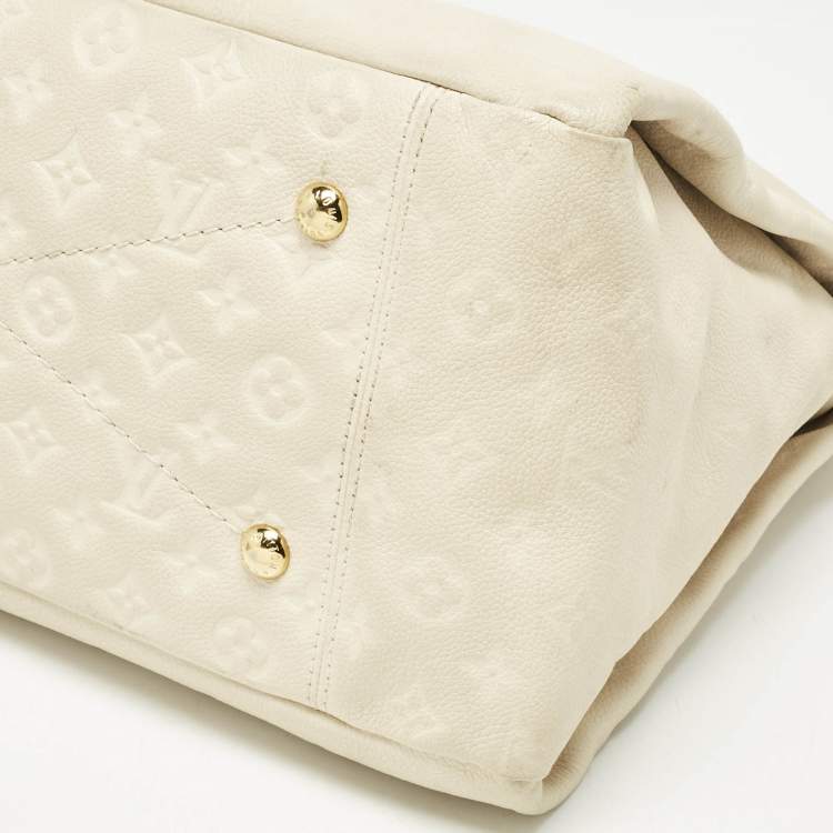 Pre Owned Louis Vuitton Neige Monogram Empreinte Leather Artsy MM Bag
