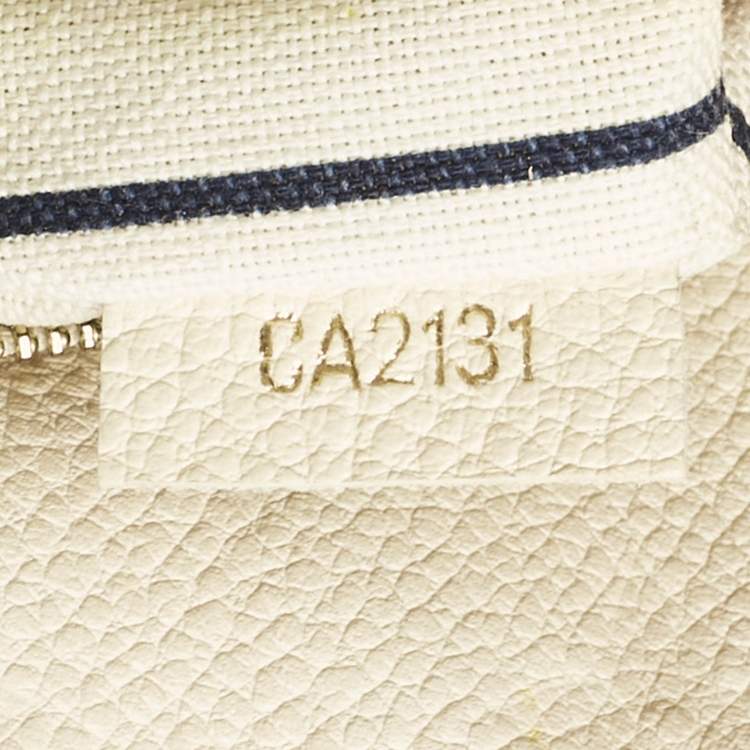 Pre Owned Louis Vuitton Neige Monogram Empreinte Leather Artsy MM Bag