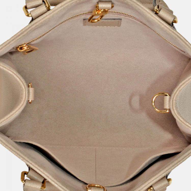 Pre Owned Louis Vuitton On The Go PM Beige Monogram Empreinte Leather Tote Bag