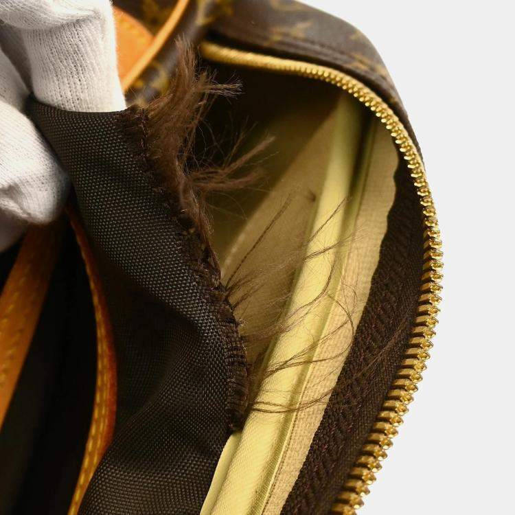 Pre Owned Louis Vuitton Brown Monogram Evasion Travel Bag