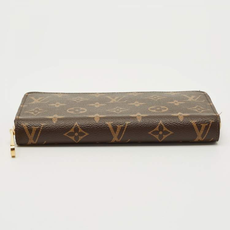 Pre Owned Louis Vuitton Monogram Canvas Zippy Wallet
