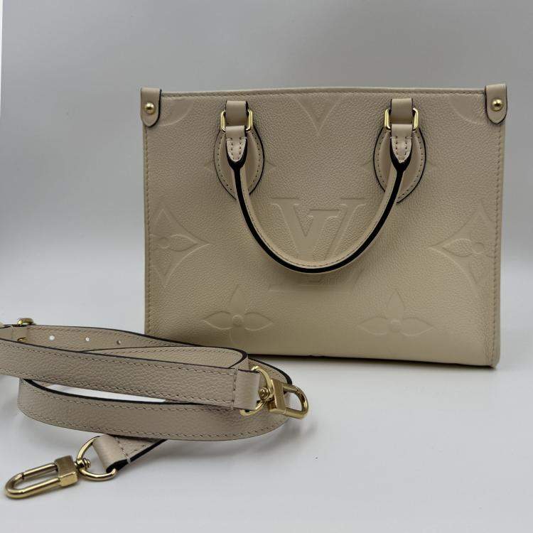 Pre Owned Louis Vuitton Onthego white Monogram Empreinte Leather Size PM