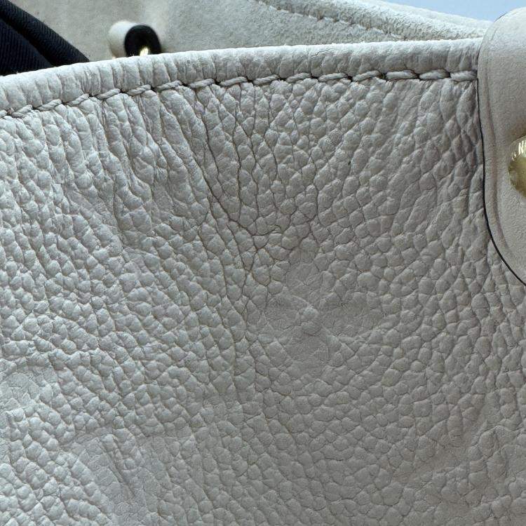 Pre Owned Louis Vuitton Onthego white Monogram Empreinte Leather Size PM