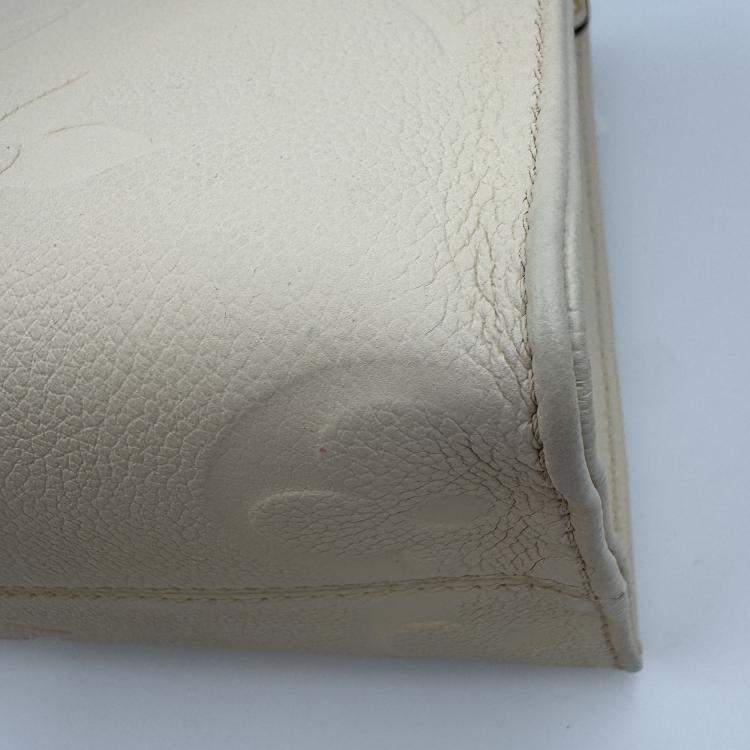 Pre Owned Louis Vuitton Onthego white Monogram Empreinte Leather Size PM