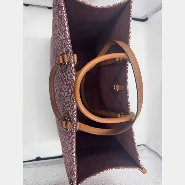 Pre Owned Louis Vuitton Onthego GM Monogram Jacquard Since 1854 Canvas Tote Bag