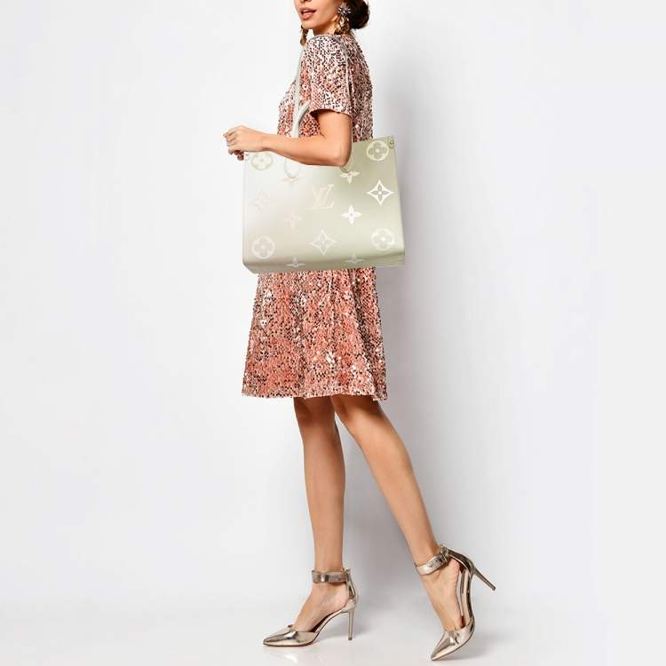 Pre Owned Louis Vuitton Sunset Khaki Monogram Giant Empreinte Leather Onthego MM Bag