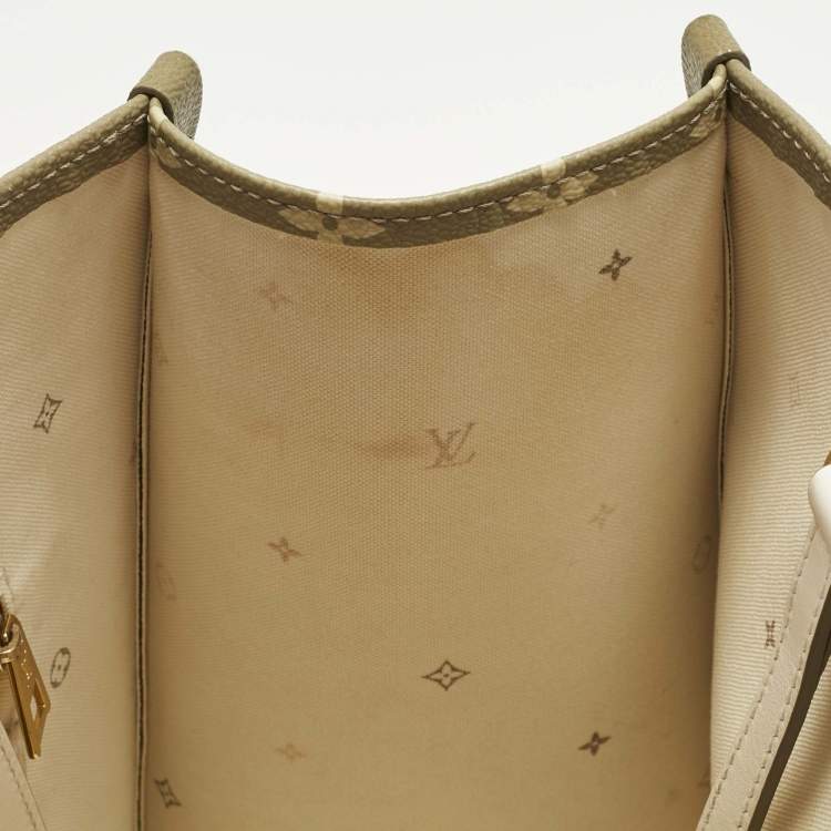 Pre Owned Louis Vuitton Sunset Khaki Monogram Giant Empreinte Leather Onthego MM Bag