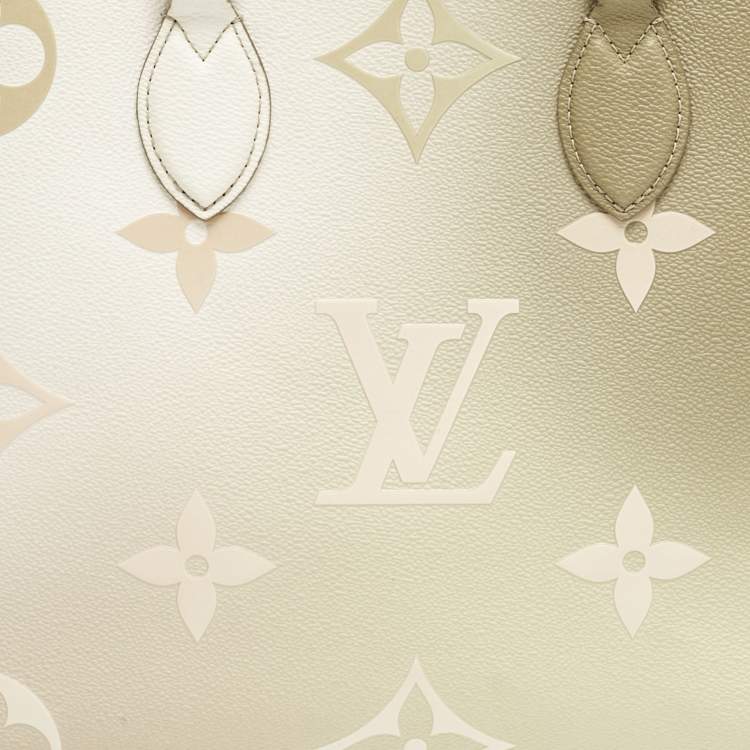 Pre Owned Louis Vuitton Sunset Khaki Monogram Giant Empreinte Leather Onthego MM Bag