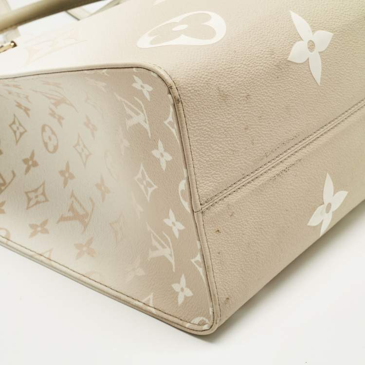 Pre Owned Louis Vuitton Sunset Khaki Monogram Giant Empreinte Leather Onthego MM Bag