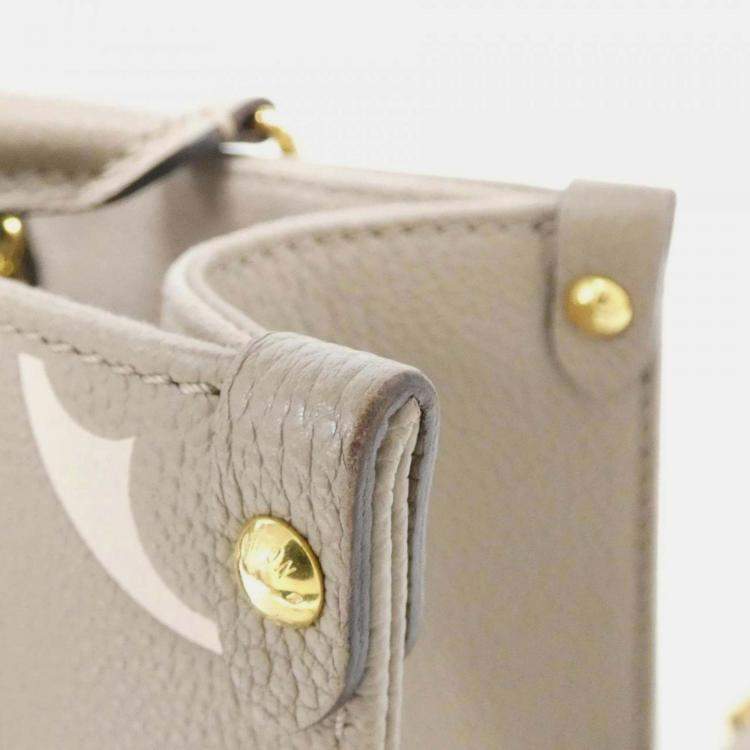 Pre Owned Louis Vuitton Two-Tone Monogram Empreinte On-The-Go Pm Handbag