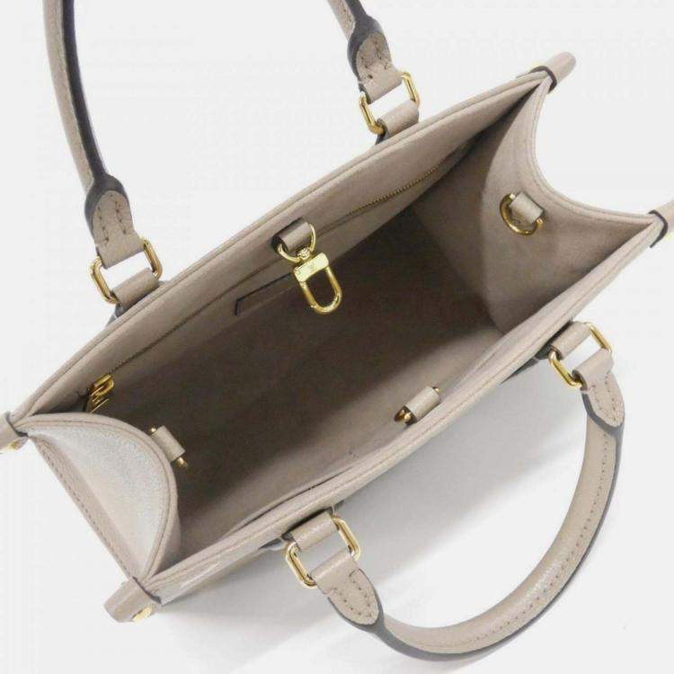 Pre Owned Louis Vuitton Two-Tone Monogram Empreinte On-The-Go Pm Handbag