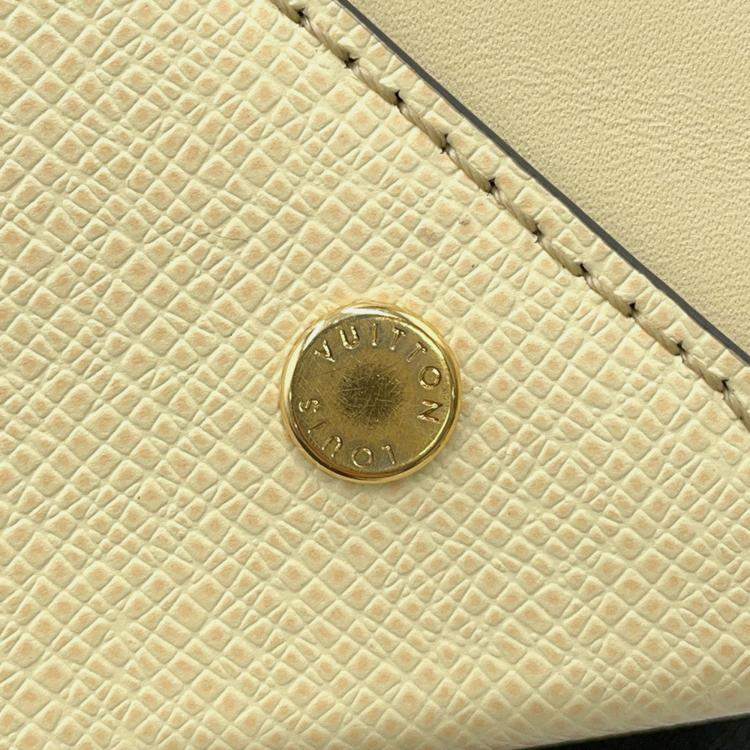 Pre Owned Louis Vuitton City Frame Yellow Taiga Calfskin Leather Top Handle Bag