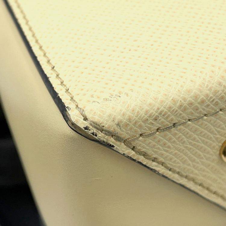 Pre Owned Louis Vuitton City Frame Yellow Taiga Calfskin Leather Top Handle Bag