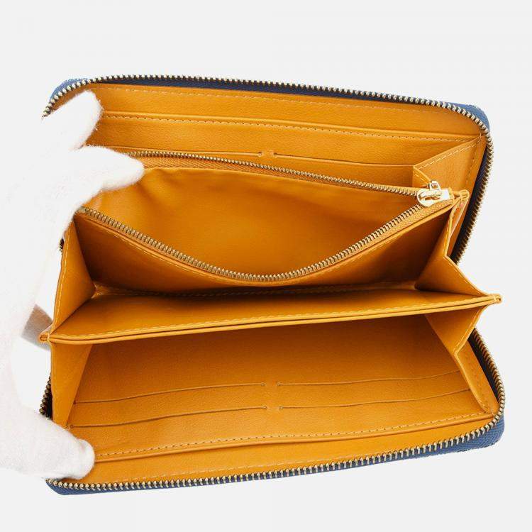 مملوكة مسبقًا Louis Vuitton Zippy Blue Monogram Denim Wallet