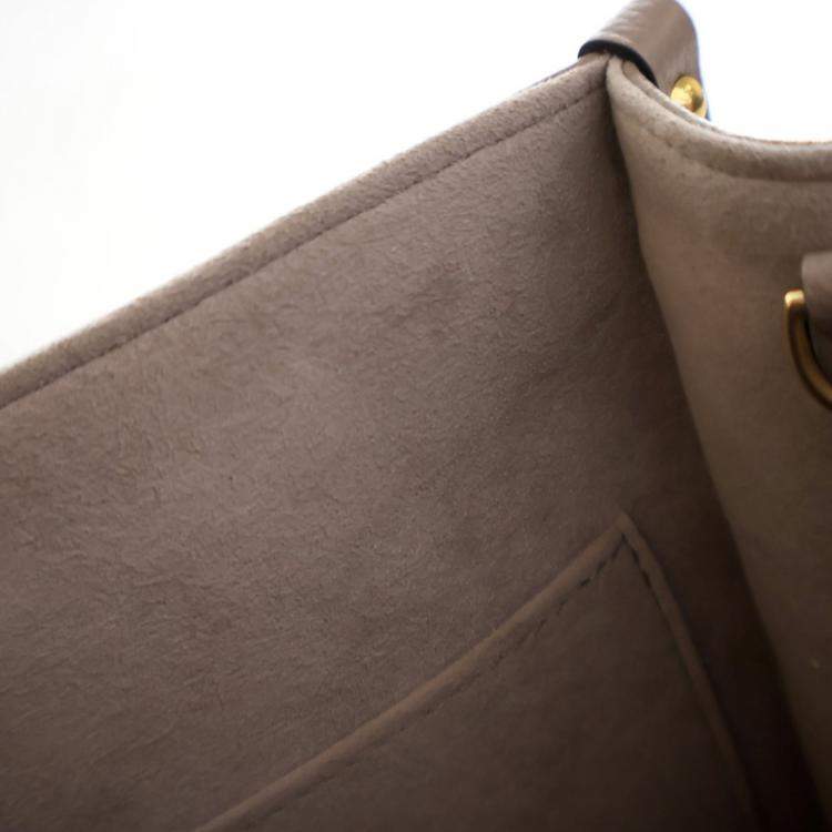 Pre Owned Louis Vuitton Beige Monogram Empreinte Giant OnTheGo PM