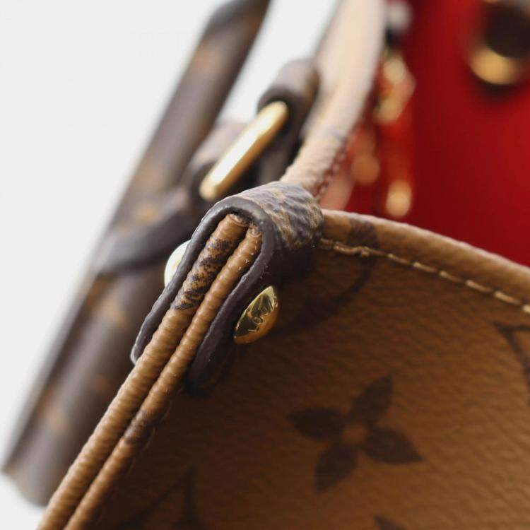 Pre Owned Louis Vuitton On The Go Pm Handbag In Coated Canvas With Monogram Giant Reverse Brown And Beige