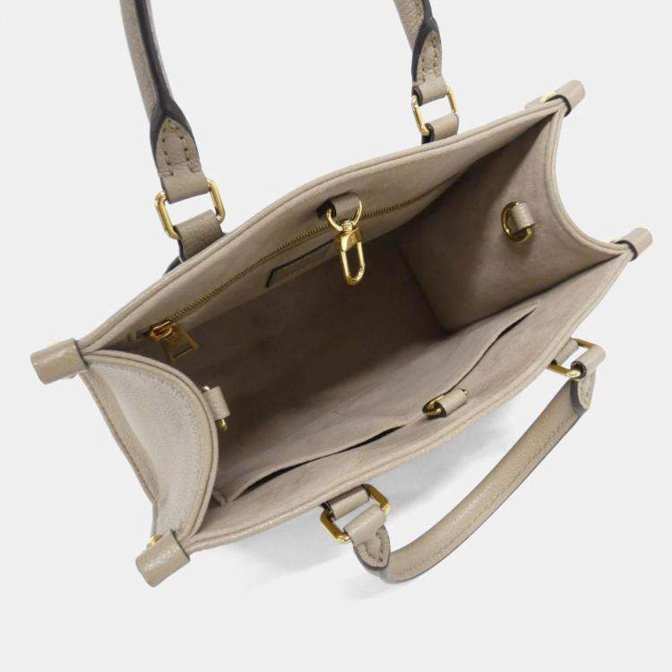 Pre Owned Louis Vuitton Two-Tone Monogram Empreinte On-The-Go Pm Handbag