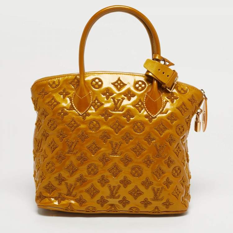مملوكة مسبقًا Louis Vuitton Lock It PM Mustard Monogram Fascination Bag