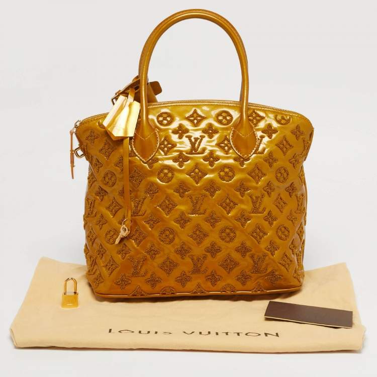 مملوكة مسبقًا Louis Vuitton Lock It PM Mustard Monogram Fascination Bag