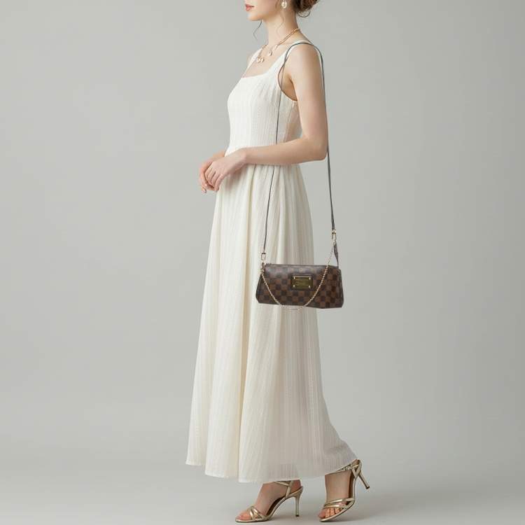 مملوكة مسبقًا Louis Vuitton Eva Damier Ebene Canvas Pochette