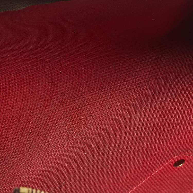 مملوكة مسبقًا Louis Vuitton Eva Damier Ebene Canvas Pochette