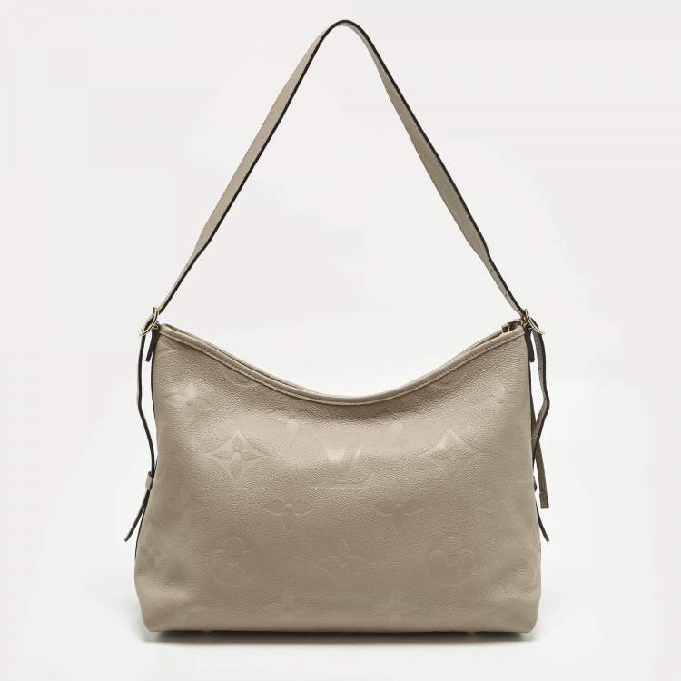 مملوكة مسبقًا Louis Vuitton CarryAll MM Tourterelle Monogram Giant Empreinte Leather Hobo