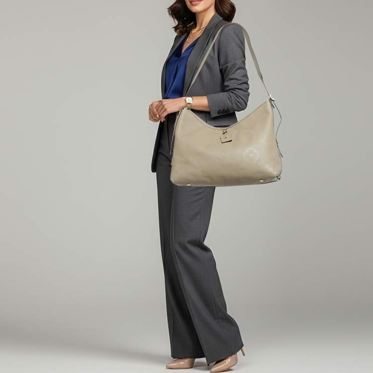 مملوكة مسبقًا Louis Vuitton CarryAll MM Tourterelle Monogram Giant Empreinte Leather Hobo