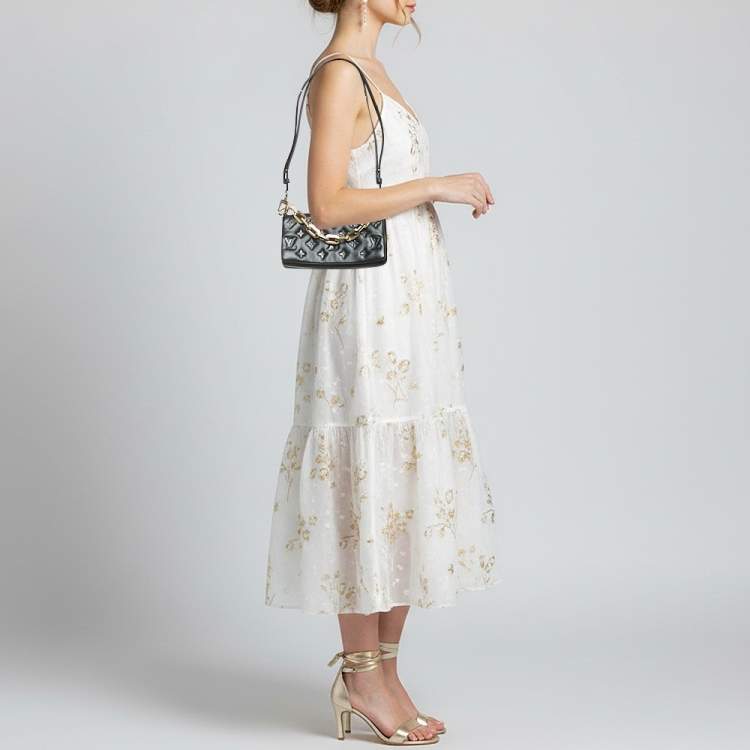 Pre Owned Louis Vuitton Coussin Black Monogram Embossed Leather Pochette