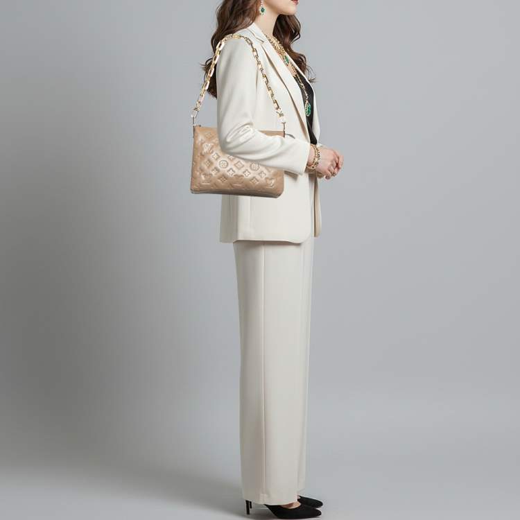 Pre Owned Louis Vuitton Coussin PM Taupe Monogram Embossed Bag