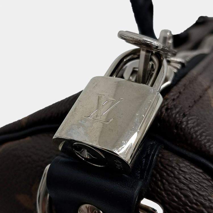 مملوكة مسبقًا Louis Vuitton Brown PVC Makassar Bandouliere Keepall 45
