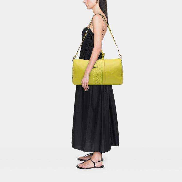 مملوكة مسبقًا Louis Vuitton Yellow Taigarama Keepall Bandouliere 50
