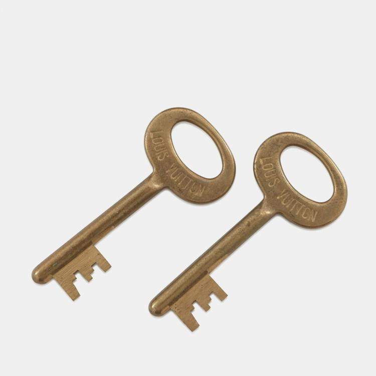 مملوكة مسبقًا Louis Vuitton Trunk Monogram Tabor 26