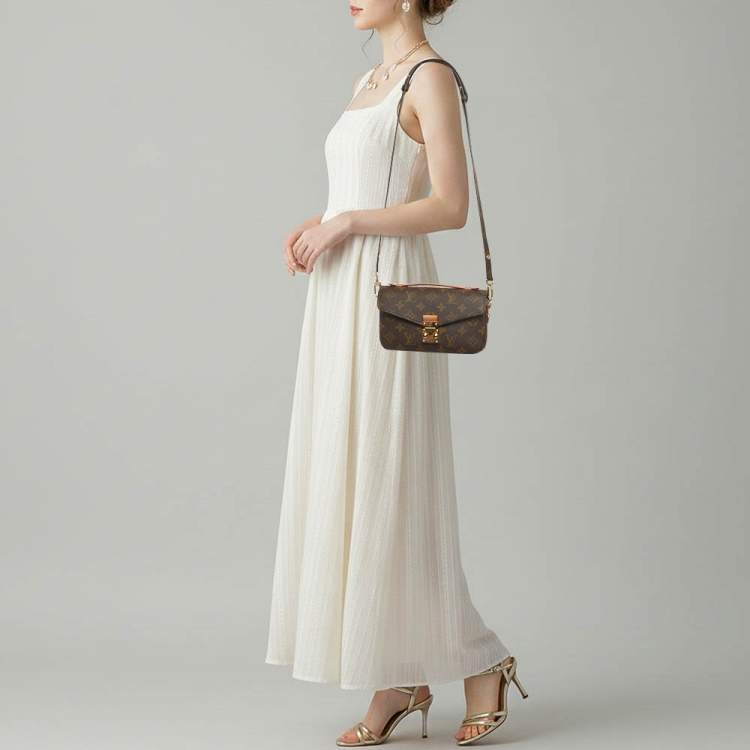 Pre Owned Louis Vuitton Pochette Métis East West Monogram Canvas Bag