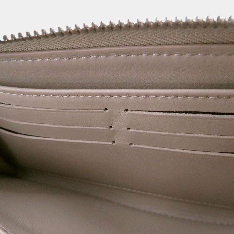 مملوكة مسبقًا Louis Vuitton Zippy Wallet Galet Monogram Mahina