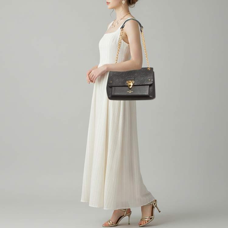 Pre Owned Louis Vuitton Vavin MM Black Monogram Empreinte Leather Bag