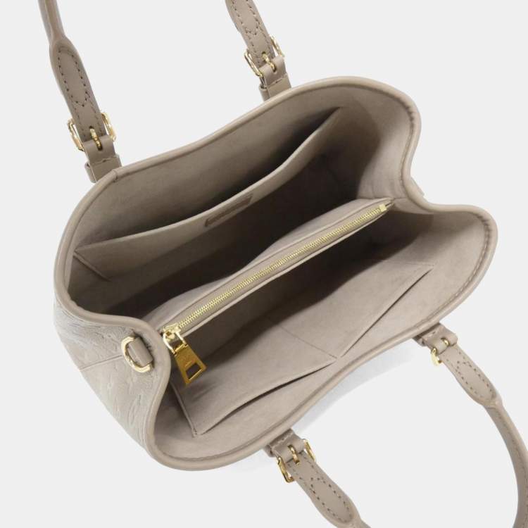 Pre Owned Louis Vuitton Beige Monogram Empreinte Babylon Tote PM Handbag