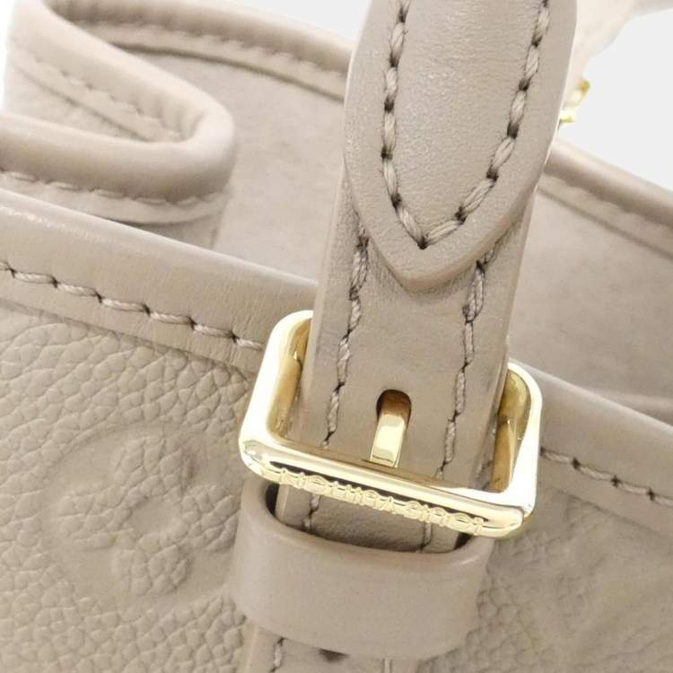 Pre Owned Louis Vuitton Beige Monogram Empreinte Babylon Tote PM Handbag