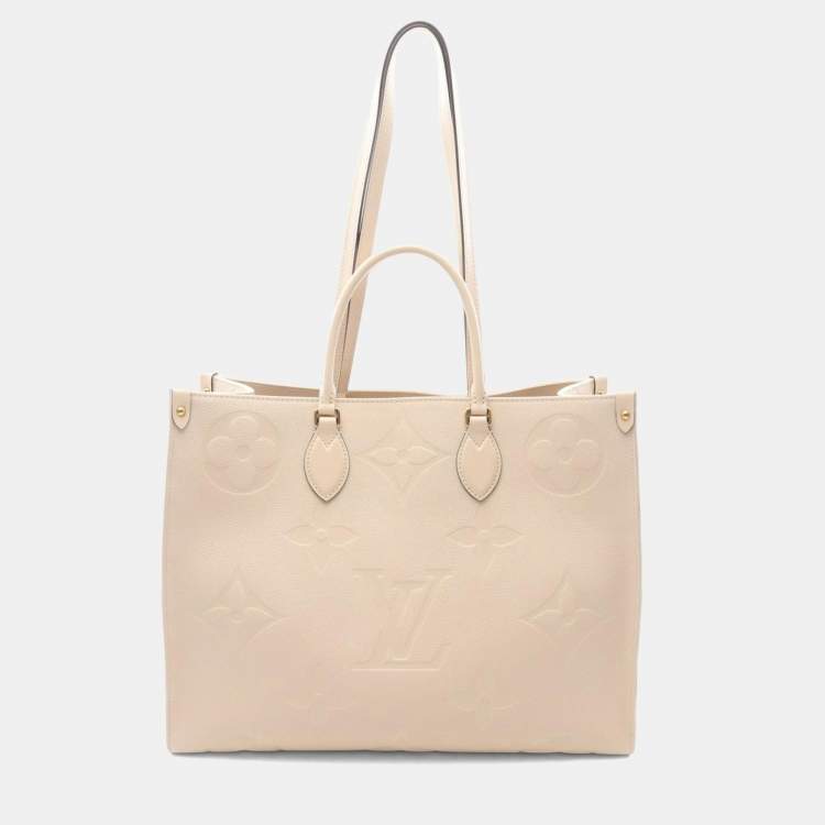 Pre Owned Louis Vuitton On The Go Gm Tote Bag In Monogram Empreinte Leather Ivory