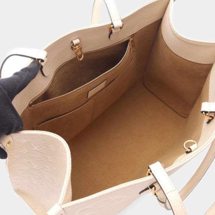 Pre Owned Louis Vuitton On The Go Gm Tote Bag In Monogram Empreinte Leather Ivory
