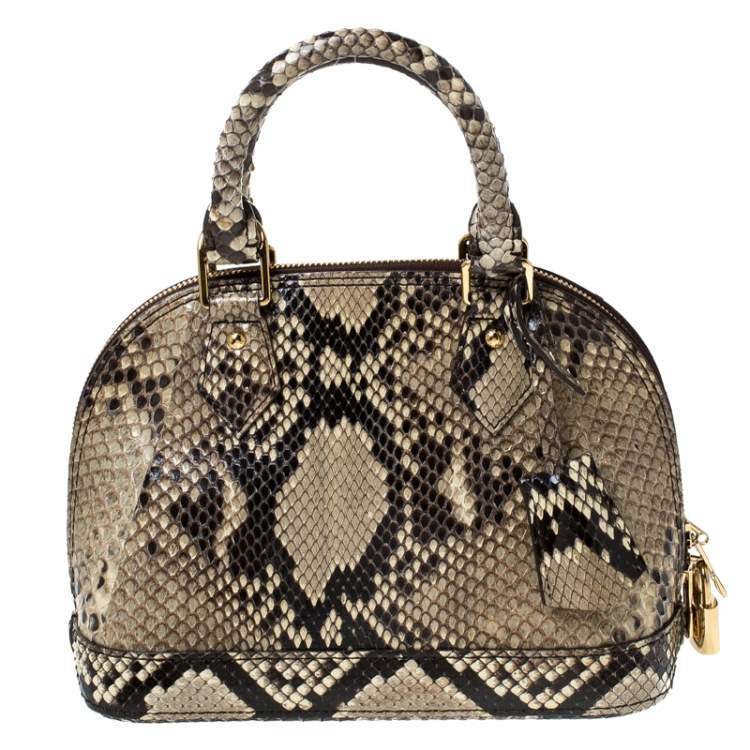 Louis Vuitton handbag in beige grained leather and natural python