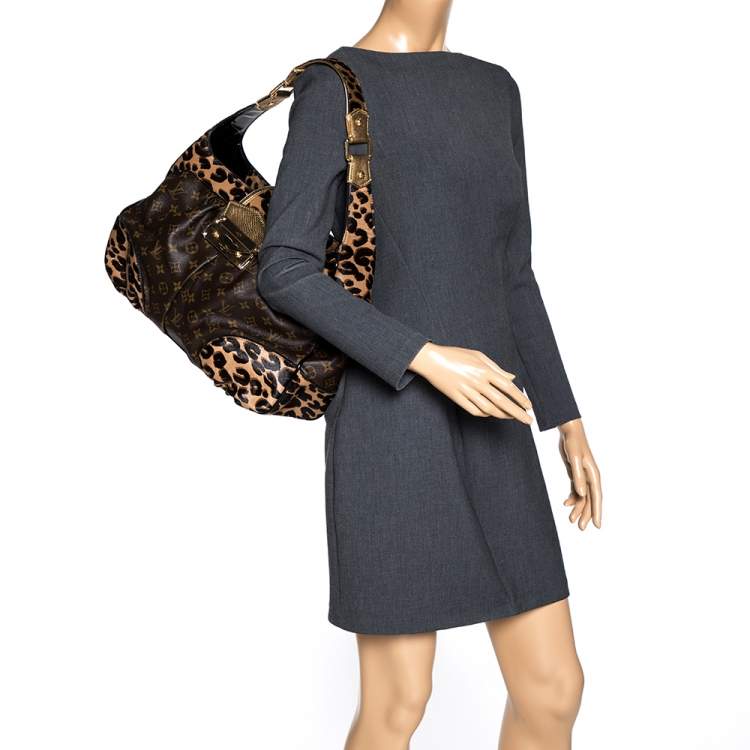 At Auction: LOUIS VUITTON Handbag LEOPARD SPEEDY BAG 30.