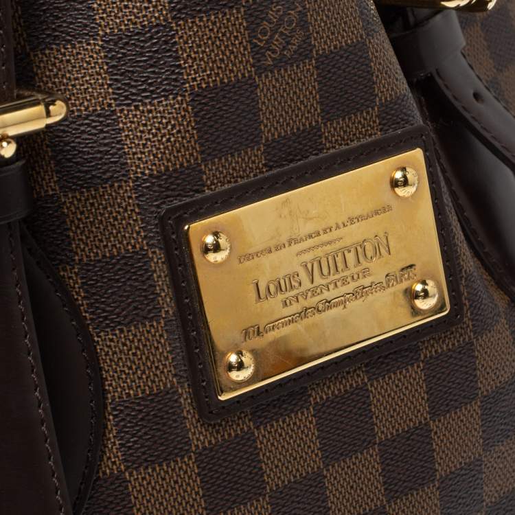 louis vuitton backpack gold plate