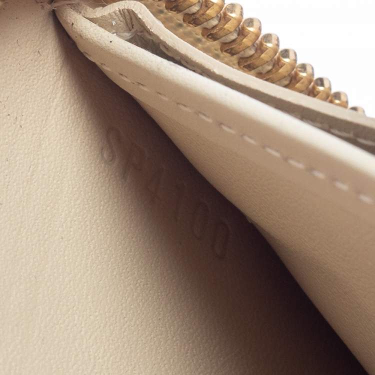 Pre Owned Louis Vuitton Cream White Monogram Vernis Zippy Wallet