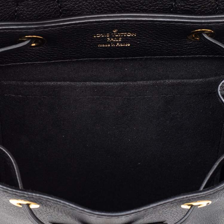 Pre Owned Louis Vuitton Black Leather Lockme Backpack Mini