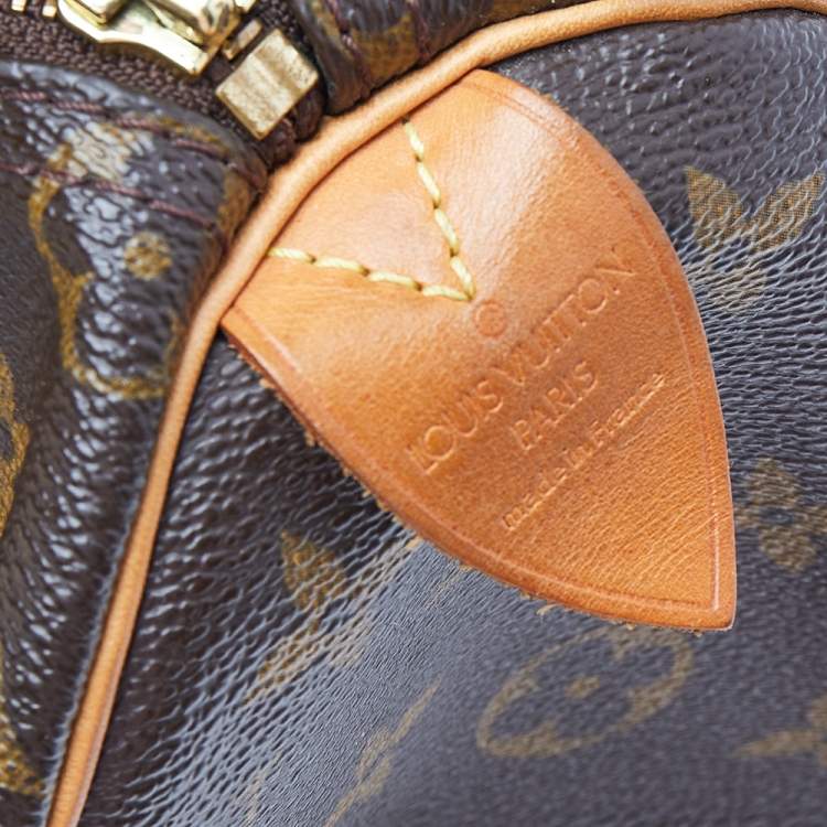 Pre Owned Louis Vuitton Monogram Canvas And Leather Speedy 25 Bag