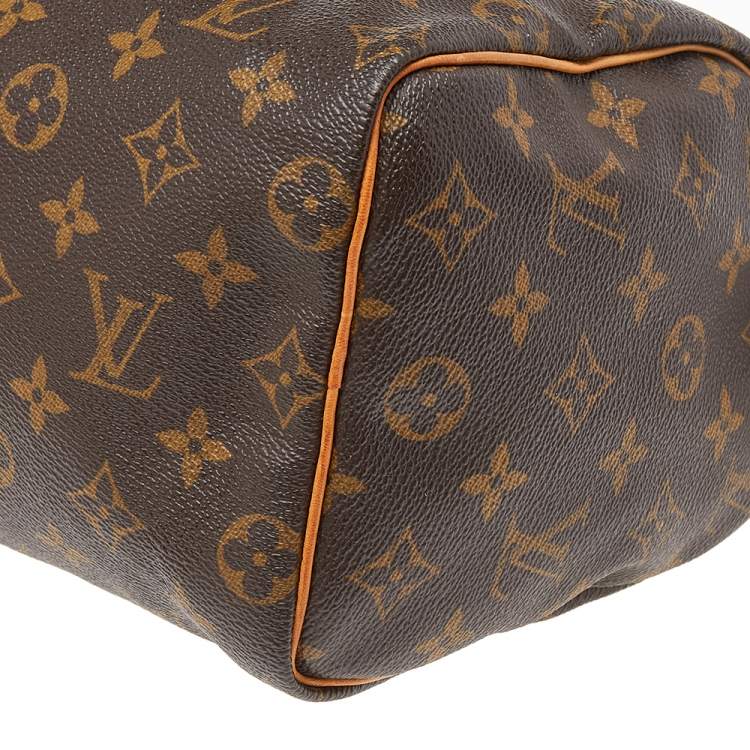 Pre Owned Louis Vuitton Monogram Canvas And Leather Speedy 25 Bag