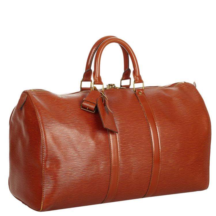 Louis Vuitton  A Louis Vuitton Keepall leather travel bag with