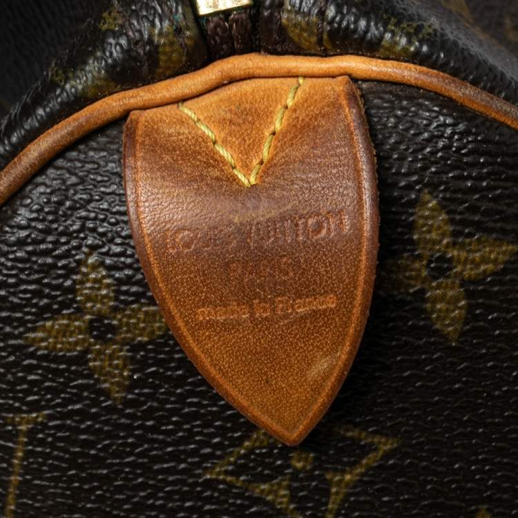 Pre Owned Louis Vuitton Monogram Canvas and Leather Speedy 25 Bag